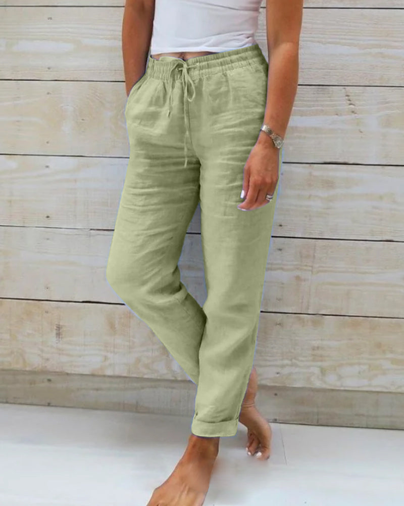 Woman wearing Sophie | Women's Relaxed Linen Pants | Casual Pants, featuring a comfortable drawstring waist and a loose, breathable fit, perfect for casual and relaxed settings.