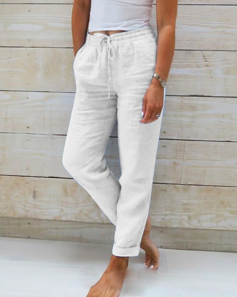 Woman wearing Sophie | Women's Relaxed Linen Pants | Casual Pants, featuring a comfortable drawstring waist and a loose, breathable fit, perfect for casual and relaxed settings.