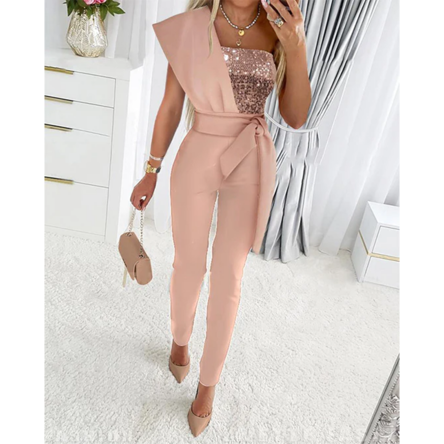 A Sophia's One-Shoulder Sequin Jumpsuit Party wear with a fitted silhouette, featuring shimmering sequins throughout and a sleek, modern design perfect for evening events or special occasions.