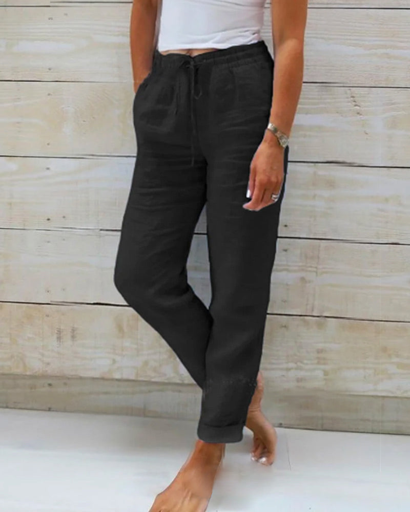 Woman wearing Sophie | Women's Relaxed Linen Pants | Casual Pants, featuring a comfortable drawstring waist and a loose, breathable fit, perfect for casual and relaxed settings.