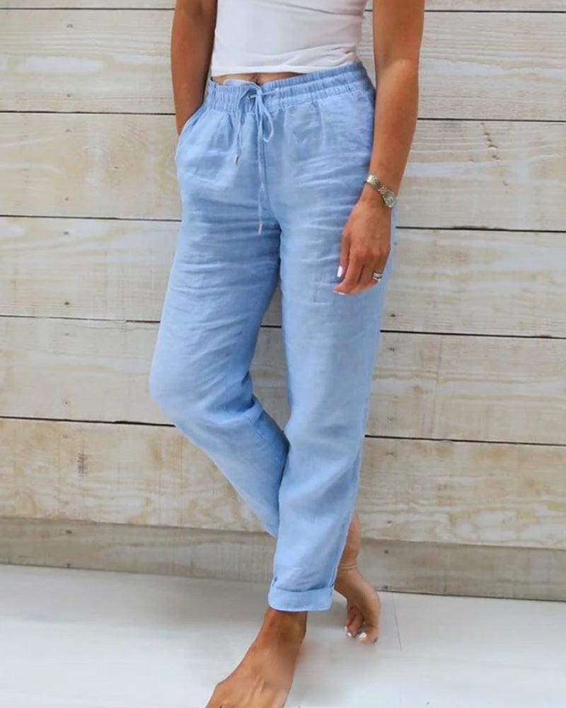 Woman wearing Sophie | Women's Relaxed Linen Pants | Casual Pants, featuring a comfortable drawstring waist and a loose, breathable fit, perfect for casual and relaxed settings.