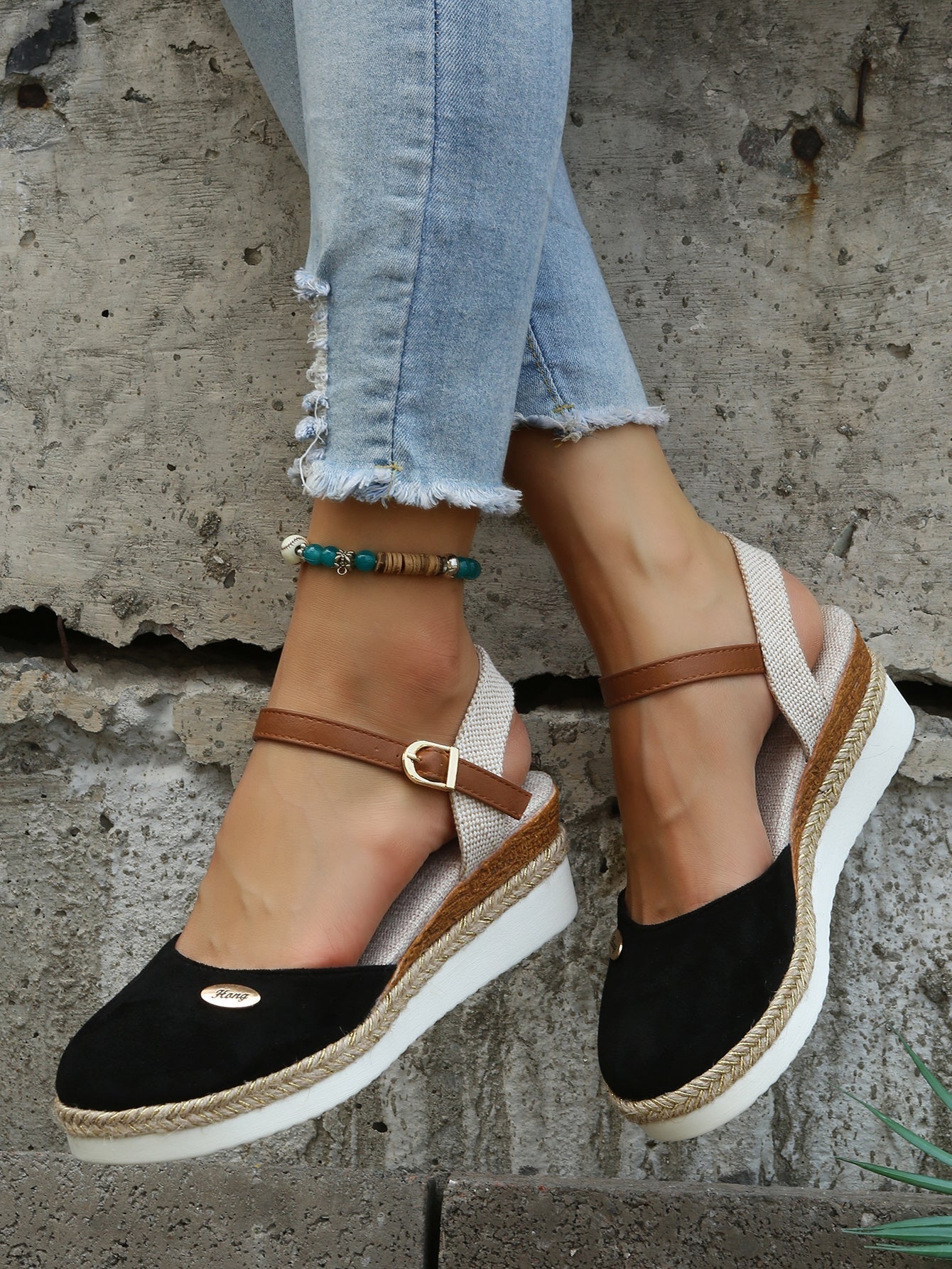 An image showcasing stylish women's wedge sandals with a comfortable design, featuring adjustable ankle straps and a supportive sole, perfect for casual or semi-formal outings.