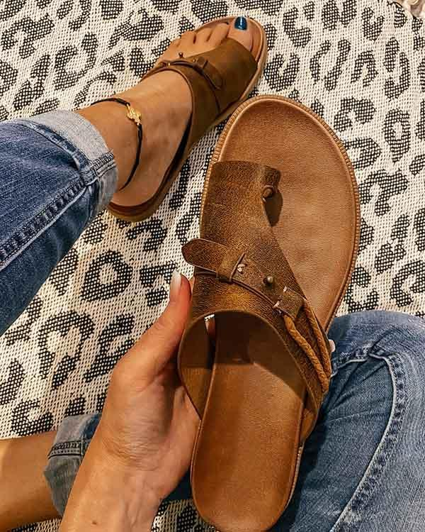 Women's stylish sandals with a comfortable design, perfect for casual outings and everyday wear, shown paired with jeans for a relaxed look.