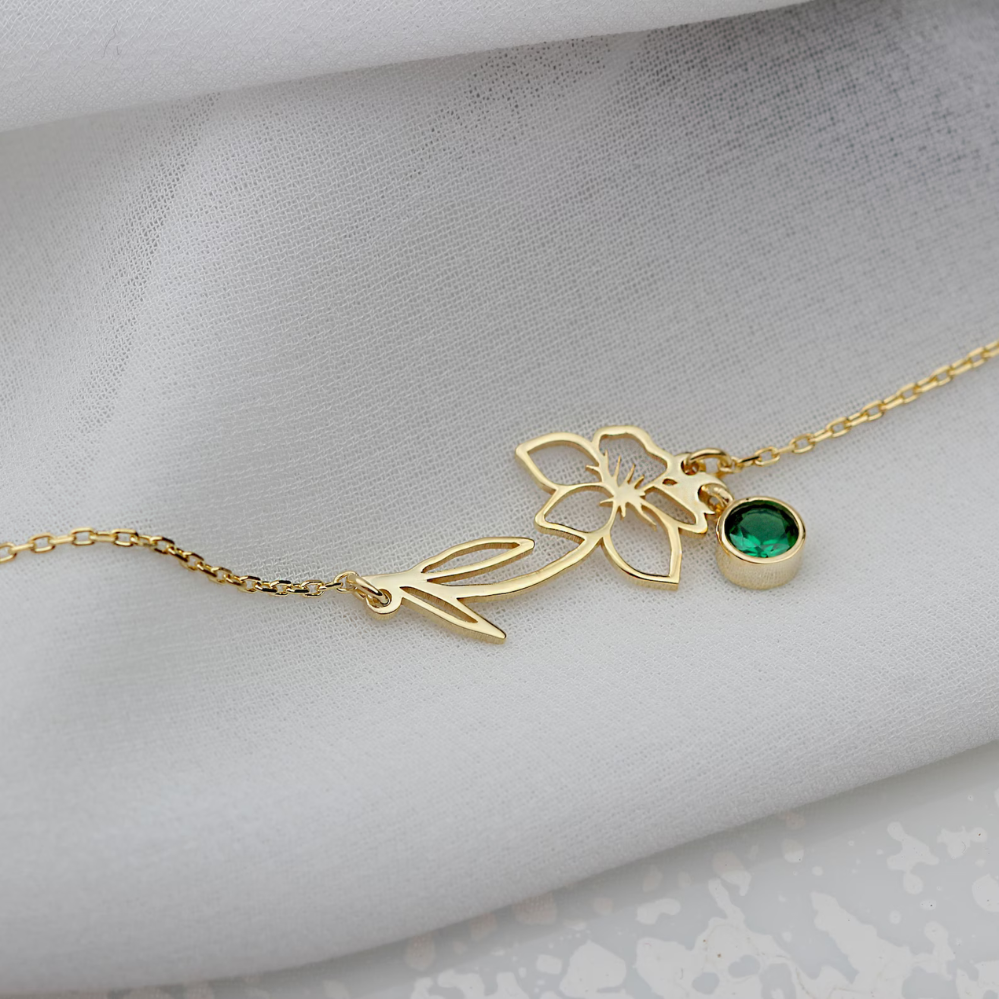 Close-up of the Lily Women's Floral Bracelet featuring a delicate floral pendant with a gemstone detail, showcasing its elegant and nature-inspired design.