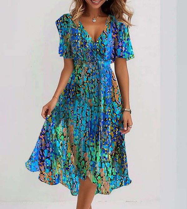 A stylish woman wearing a flowing, elegant summer dress with a flattering design, perfect for casual outings or vacations. The dress features a comfortable fit and a chic, lightweight fabric ideal for warm weather.