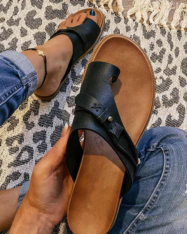 Women's stylish sandals with a comfortable design, perfect for casual outings and everyday wear, shown paired with jeans for a relaxed look.