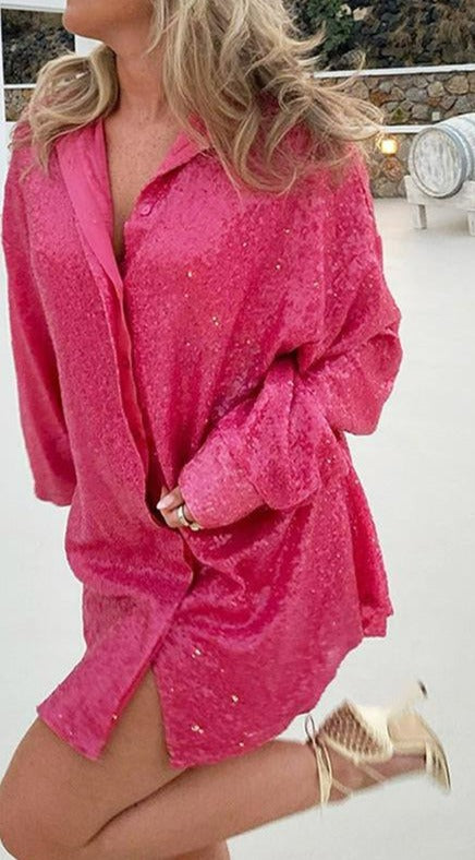 A stylish oversized sequined shirt dress for women, featuring a loose fit and shimmering details, perfect for parties or glamorous events.