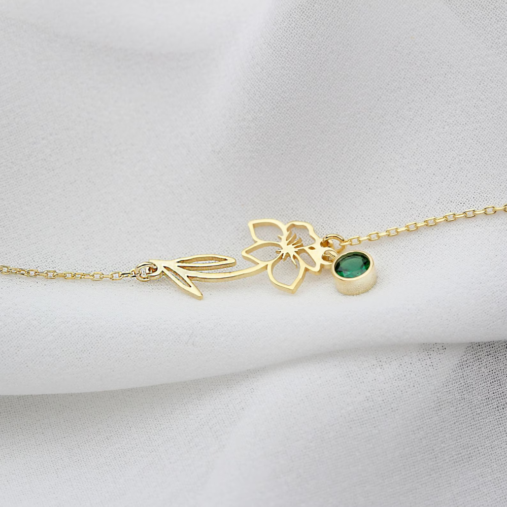 Close-up of the Lily Women's Floral Bracelet featuring a delicate floral pendant with a gemstone detail, showcasing its elegant and nature-inspired design.