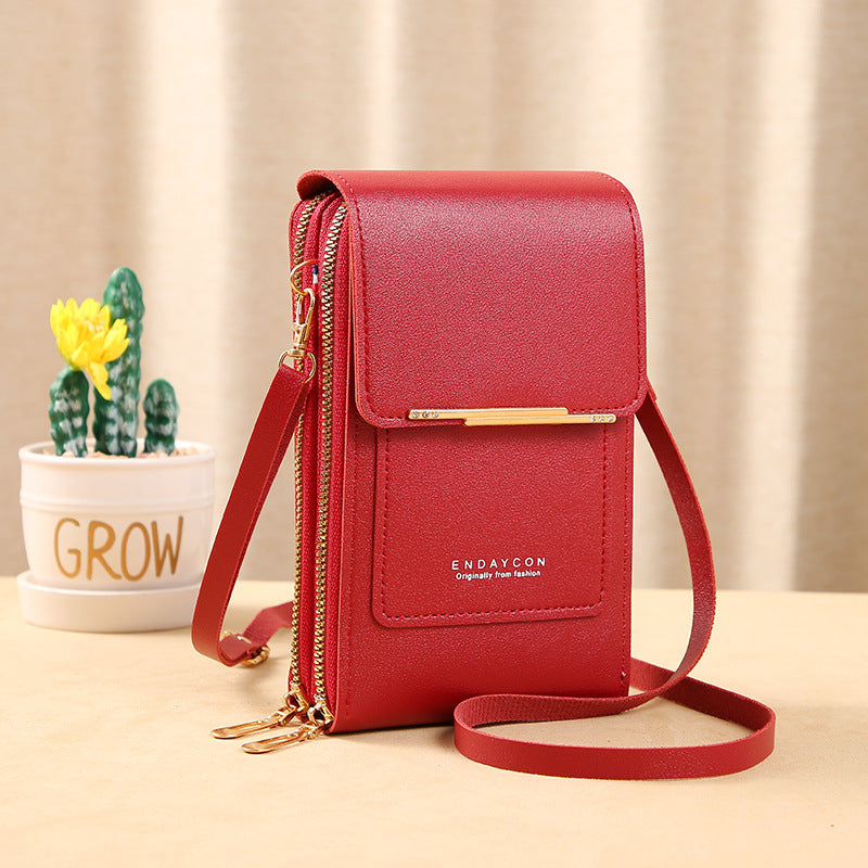 Image showing a compact and stylish women's crossbody bag with a sleek design, featuring a front flap, zipper closure, and an adjustable strap, ideal for carrying essentials on the go.
