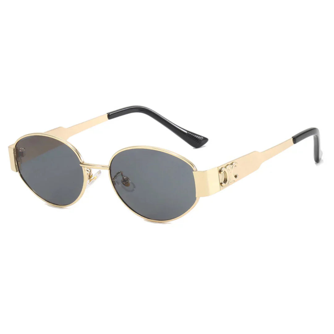 A pair of elegant women's sunglasses with a chic oval frame and stylish detailing, perfect for enhancing any outfit and providing essential UV protection. Designed for a lightweight and comfortable fit, ideal for daily wear or special occasions.