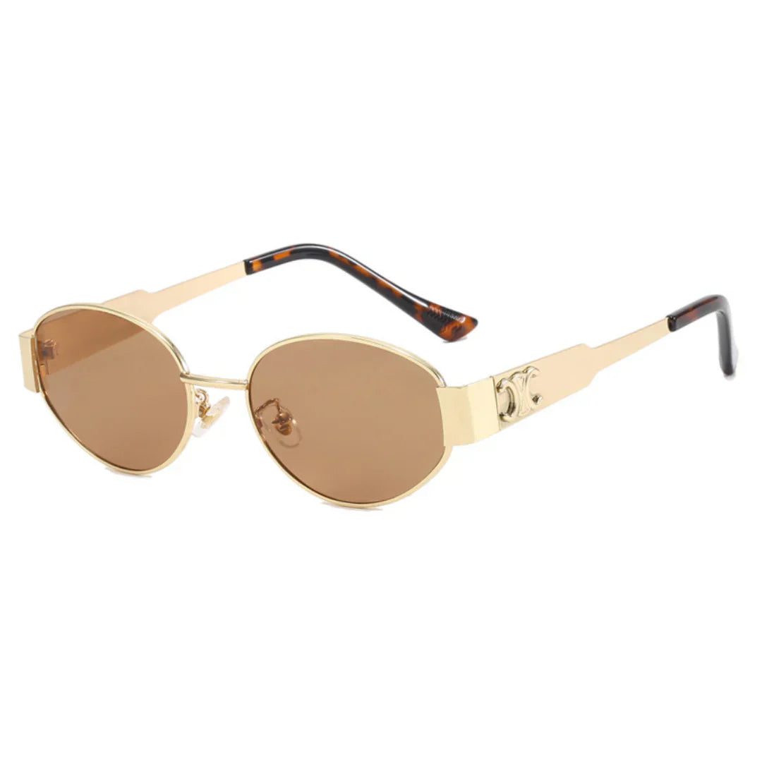 A pair of elegant women's sunglasses with a chic oval frame and stylish detailing, perfect for enhancing any outfit and providing essential UV protection. Designed for a lightweight and comfortable fit, ideal for daily wear or special occasions.