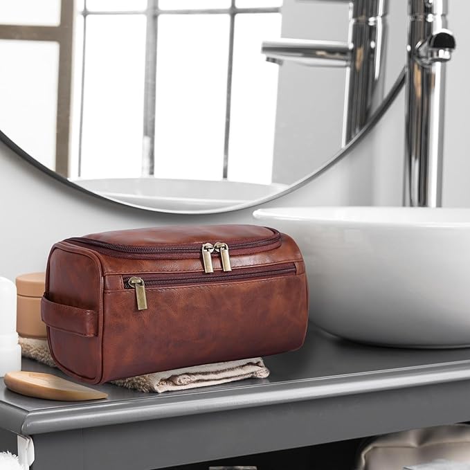 Stylish and compact toiletry bag with a durable design, featuring multiple zippers and a convenient handle for easy carrying, ideal for organizing essentials during travel.