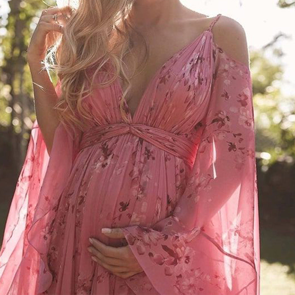 Model wearing the Isabella | Flowing Bohemian Maxi Dress, featuring a flowing silhouette and bell sleeves, perfect for capturing a romantic, free-spirited look at any special occasion or outdoor event.