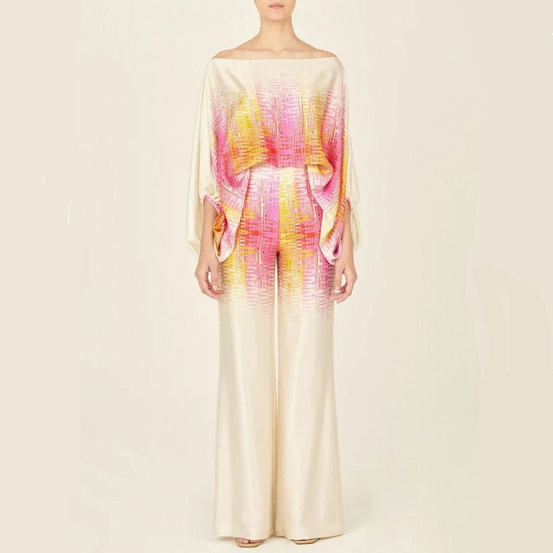 Women's summer jumpsuit with a flowing, one-shoulder design featuring vibrant patterns. Perfect for casual outings, beach days, or evening events, combining elegance and comfort for a chic summer look.