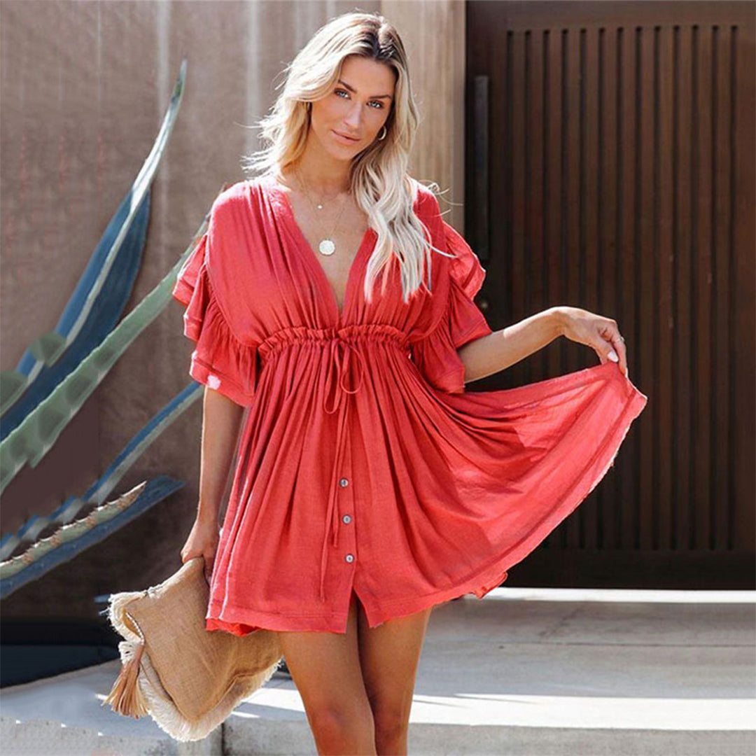 Women's flowy dress with elegant ruffle sleeves, a deep V-neckline, button-down front, and a cinched waist, perfect for a stylish and lightweight look.