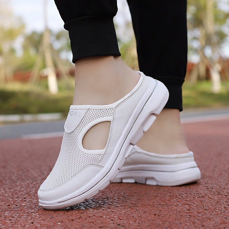 Image showing women's sporty sneakers with a breathable mesh design, featuring an open-toe and slip-on style, perfect for casual wear or active lifestyles.