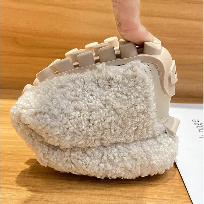 Plush slip-on women's shoes with a cozy and soft design, offering ultimate comfort and style for casual outings or indoor wear.