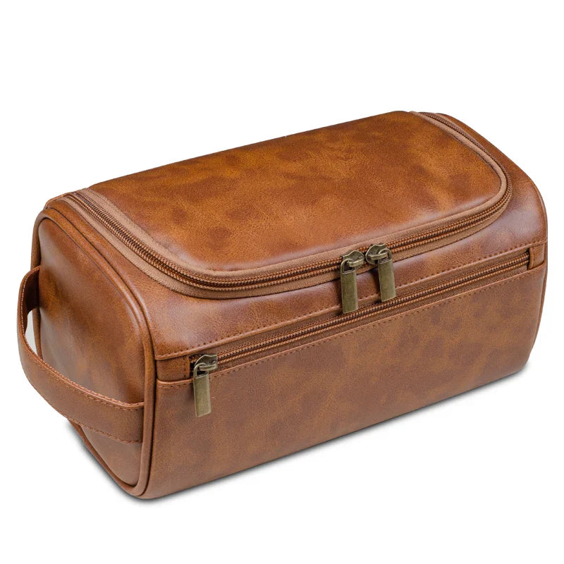Stylish and compact toiletry bag with a durable design, featuring multiple zippers and a convenient handle for easy carrying, ideal for organizing essentials during travel.