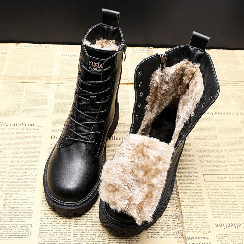 Pair of boots featuring a warm and cozy interior lining with a durable and stylish design, perfect for cold weather and outdoor activities.