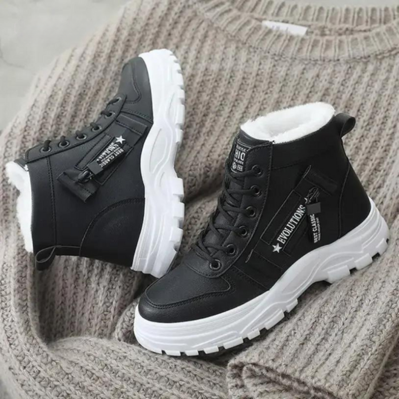 Stylish women's durable boots designed for comfort and warmth, featuring a cozy interior lining and sturdy soles, perfect for winter wear.