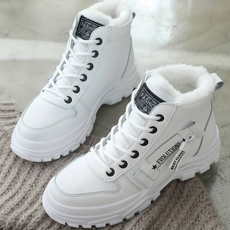 Stylish women's durable boots designed for comfort and warmth, featuring a cozy interior lining and sturdy soles, perfect for winter wear.