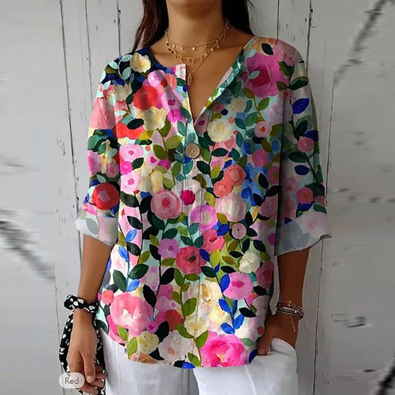 Women's floral blouse with an elegant design, featuring a button-down front and relaxed fit. Perfect for casual outings, workdays, or special occasions, offering a stylish and sophisticated look.