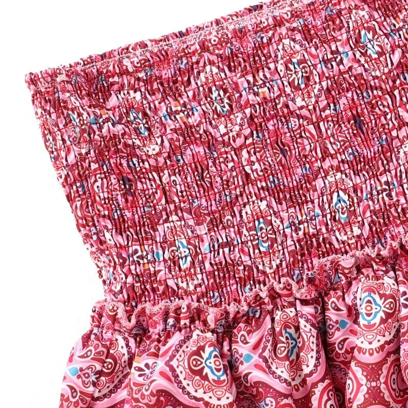 Close-up of the Ella | Tiered Ruffle Mini Skirt, showcasing its flattering smocked waistband and playful tiered ruffle design. Perfect for adding movement and style to any casual or dressed-up look.