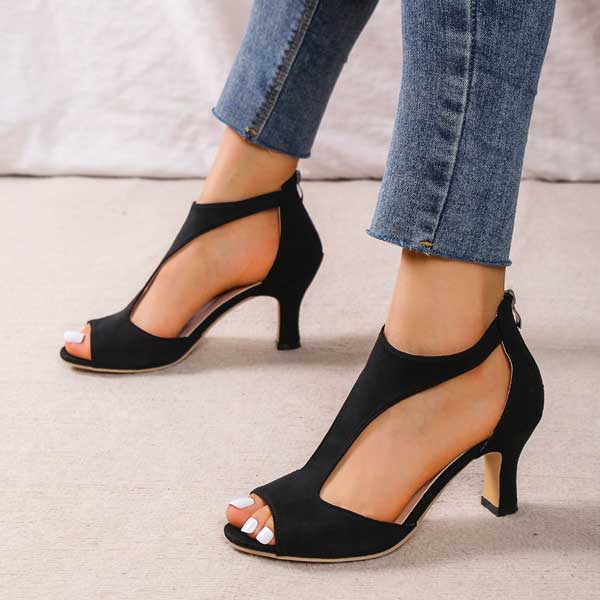 Image showing women's open-toe heels with a sleek, cut-out design and a comfortable heel, perfect for adding elegance and style to any outfit.