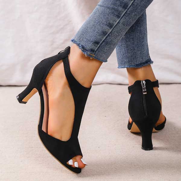 Image showing women's open-toe heels with a sleek, cut-out design and a comfortable heel, perfect for adding elegance and style to any outfit.
