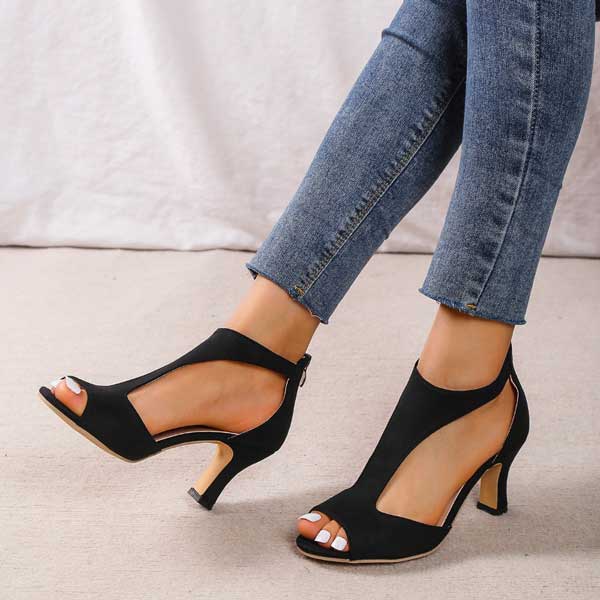 Image showing women's open-toe heels with a sleek, cut-out design and a comfortable heel, perfect for adding elegance and style to any outfit.