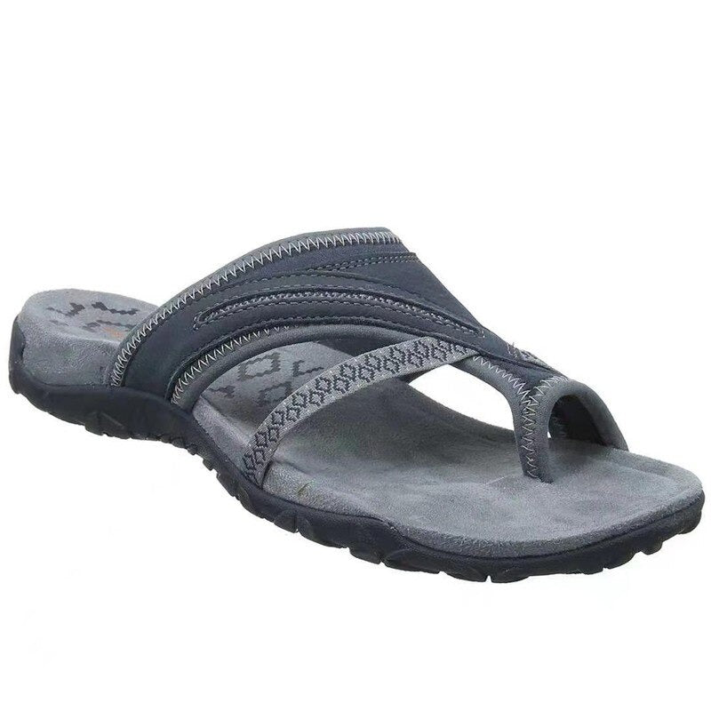 Image showing women's comfortable sandals with a supportive design, featuring crisscross straps and a durable sole, perfect for casual wear and all-day comfort.