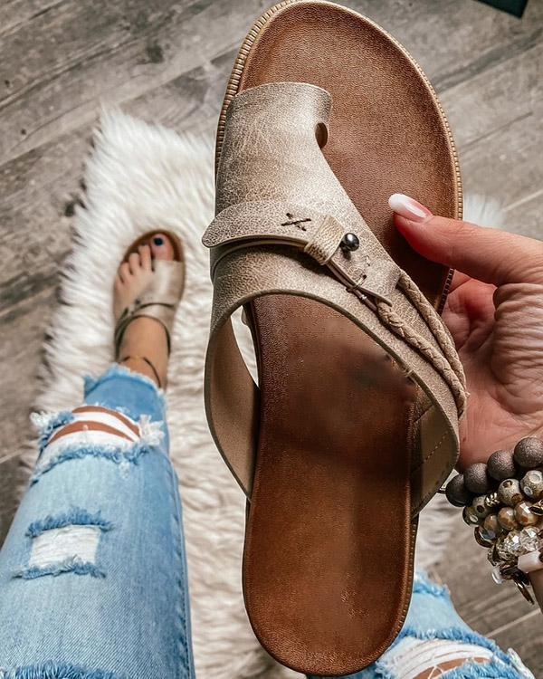Women's stylish sandals with a comfortable design, perfect for casual outings and everyday wear, shown paired with jeans for a relaxed look.