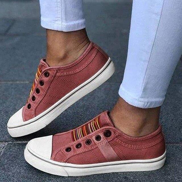 Image showing women's casual sneakers with stylish striped detailing and a classic design, perfect for everyday wear and casual outings.