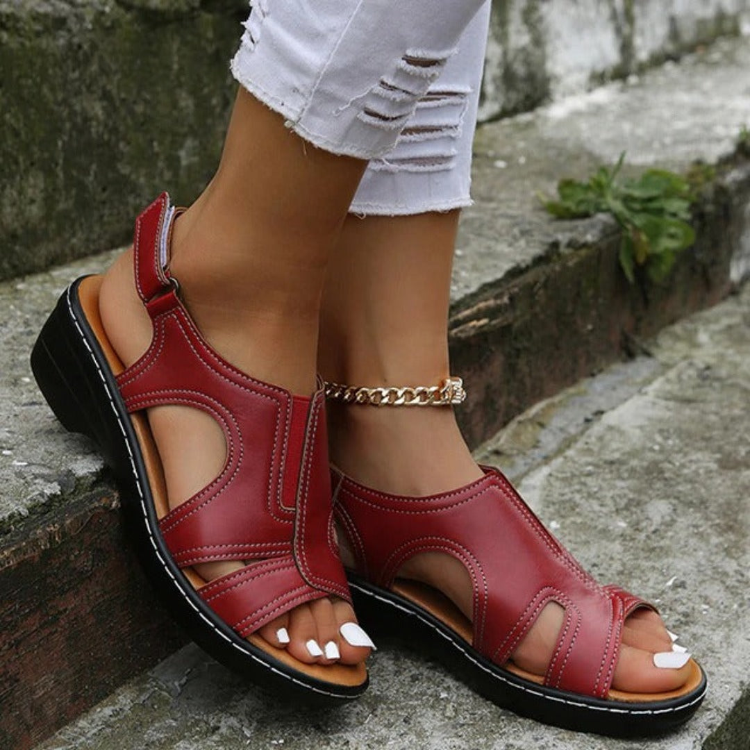 Women's casual sandals with a stylish and modern design, featuring open sides and a comfortable sole. Perfect for everyday wear, casual outings, or travel, offering both durability and elegance.