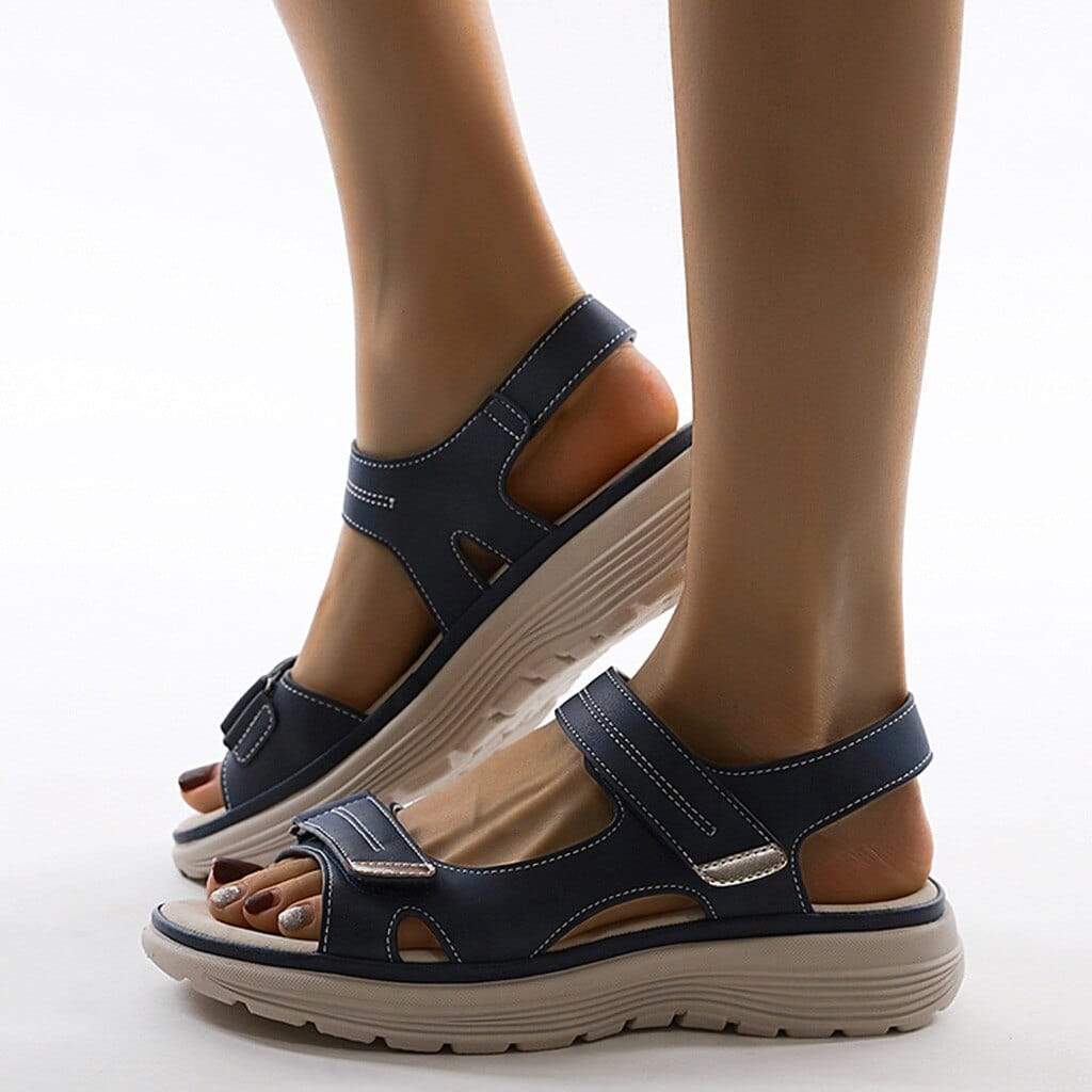 Image showing women's comfortable sandals with a supportive design, featuring adjustable straps and a durable sole, perfect for casual wear and all-day comfort.