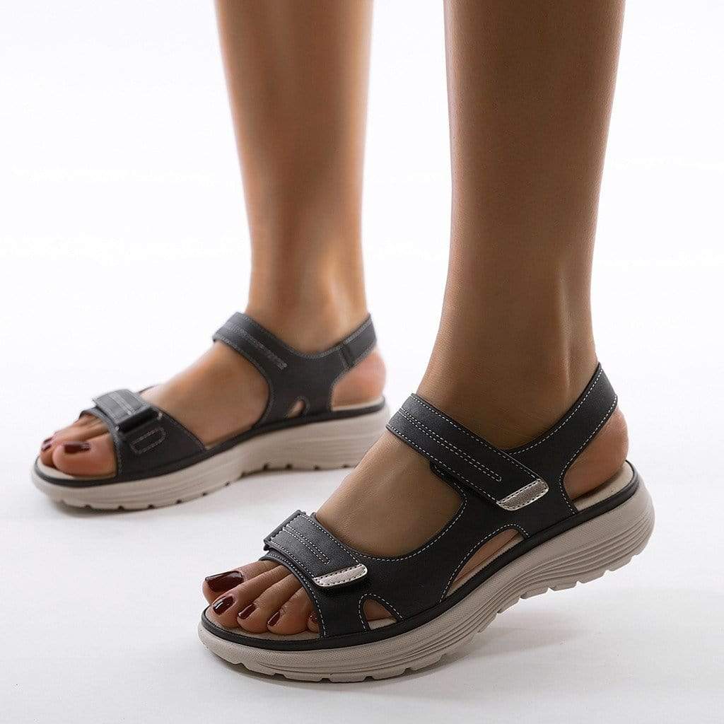 Image showing women's comfortable sandals with a supportive design, featuring adjustable straps and a durable sole, perfect for casual wear and all-day comfort.