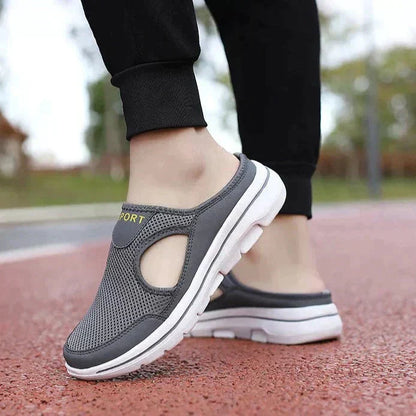 Image showing women's sporty sneakers with a breathable mesh design, featuring an open-toe and slip-on style, perfect for casual wear or active lifestyles.