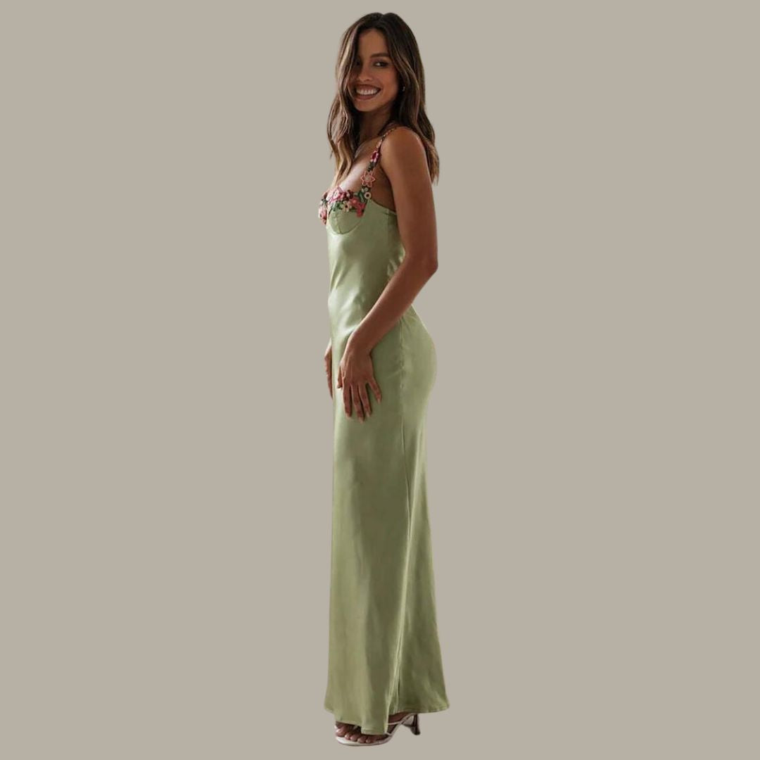 Model wearing the Maya Women's Embroidered Strap Dress, featuring intricate embroidery on the straps and a form-fitting, elegant silhouette, perfect for special occasions and sophisticated styling.