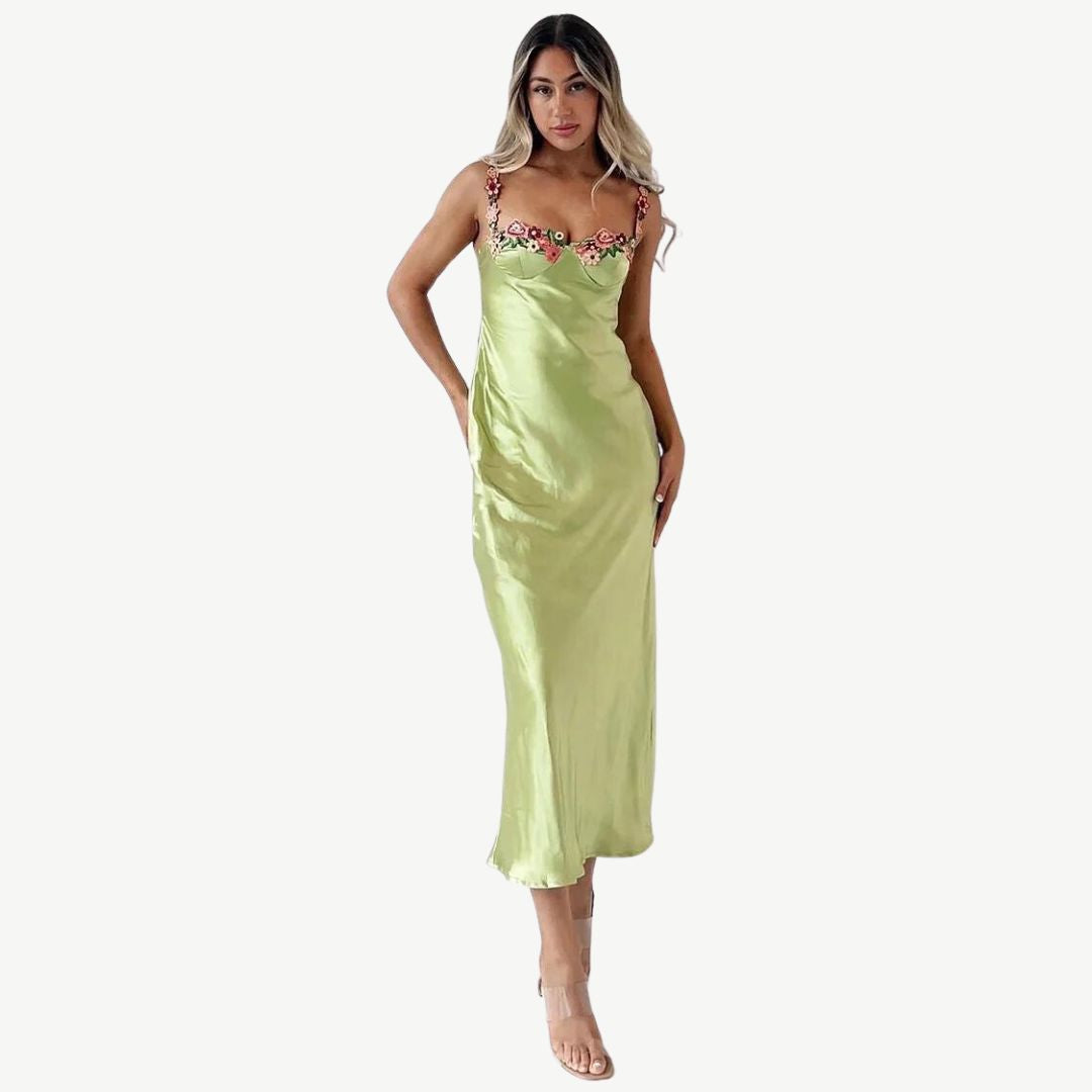 Model wearing the Maya Women's Embroidered Strap Dress, featuring intricate embroidery on the straps and a form-fitting, elegant silhouette, perfect for special occasions and sophisticated styling.