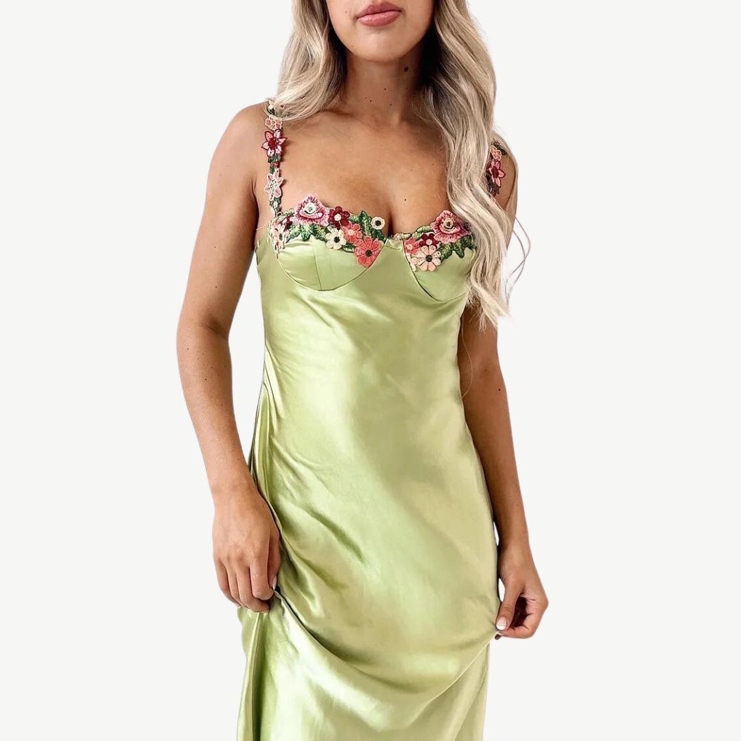 Model wearing the Maya Women's Embroidered Strap Dress, featuring intricate embroidery on the straps and a form-fitting, elegant silhouette, perfect for special occasions and sophisticated styling.