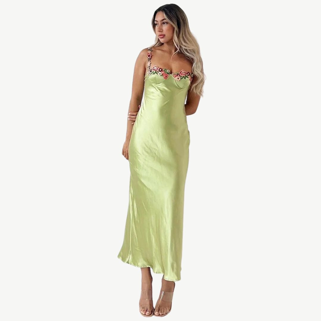 Model wearing the Maya Women's Embroidered Strap Dress, featuring intricate embroidery on the straps and a form-fitting, elegant silhouette, perfect for special occasions and sophisticated styling.
