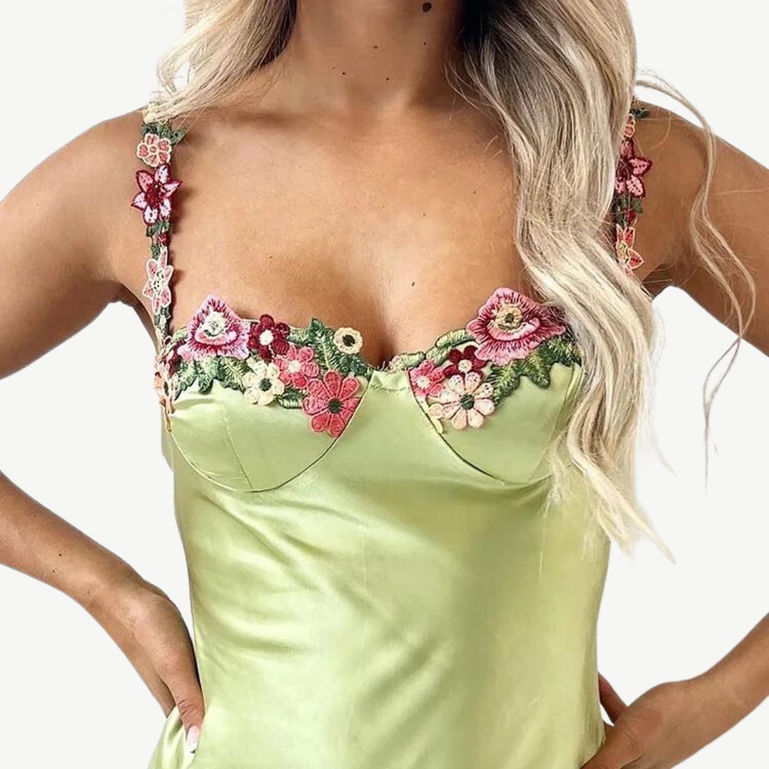Model wearing the Maya Women's Embroidered Strap Dress, featuring intricate embroidery on the straps and a form-fitting, elegant silhouette, perfect for special occasions and sophisticated styling.