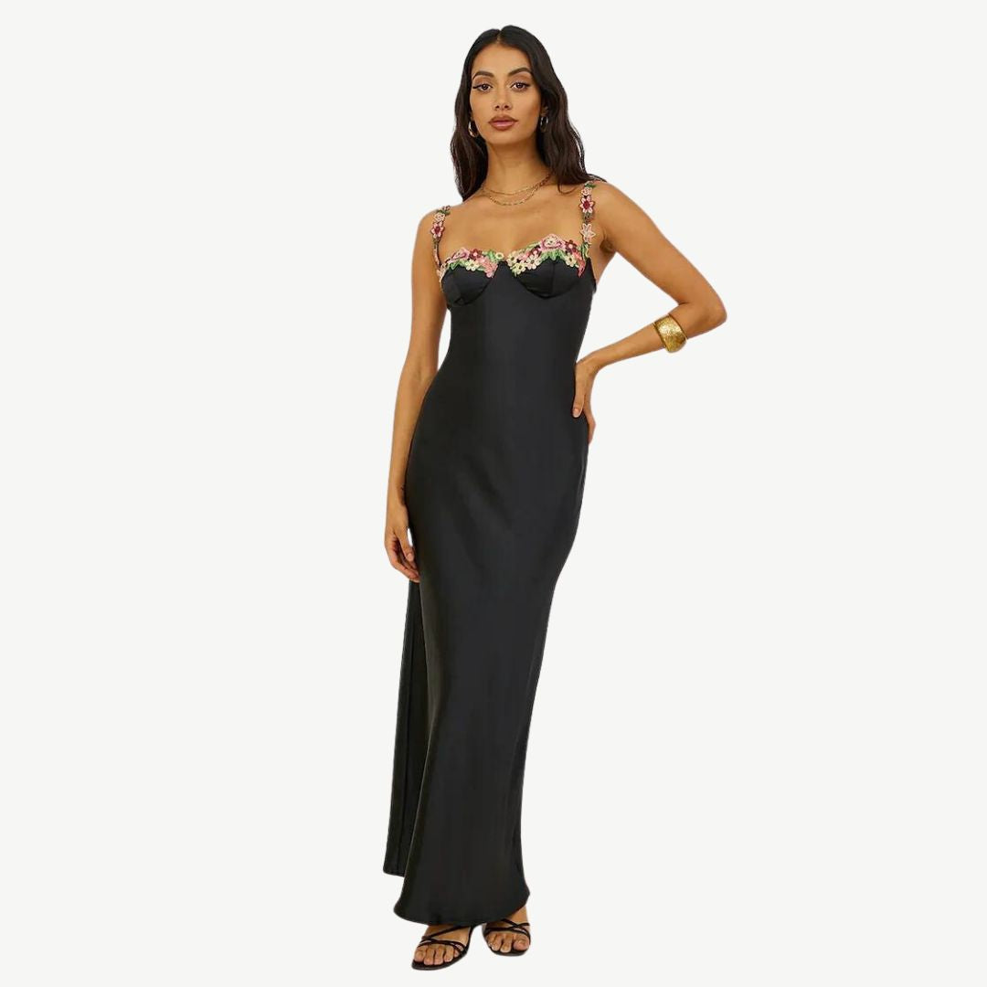 Model wearing the Maya Women's Embroidered Strap Dress, featuring intricate embroidery on the straps and a form-fitting, elegant silhouette, perfect for special occasions and sophisticated styling.