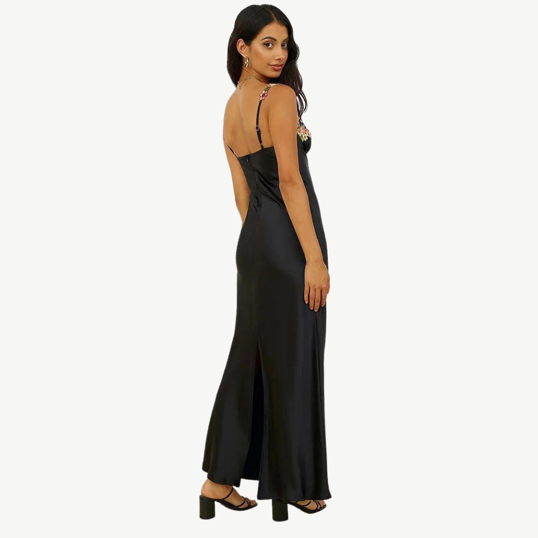 Model wearing the Maya Women's Embroidered Strap Dress, featuring intricate embroidery on the straps and a form-fitting, elegant silhouette, perfect for special occasions and sophisticated styling.