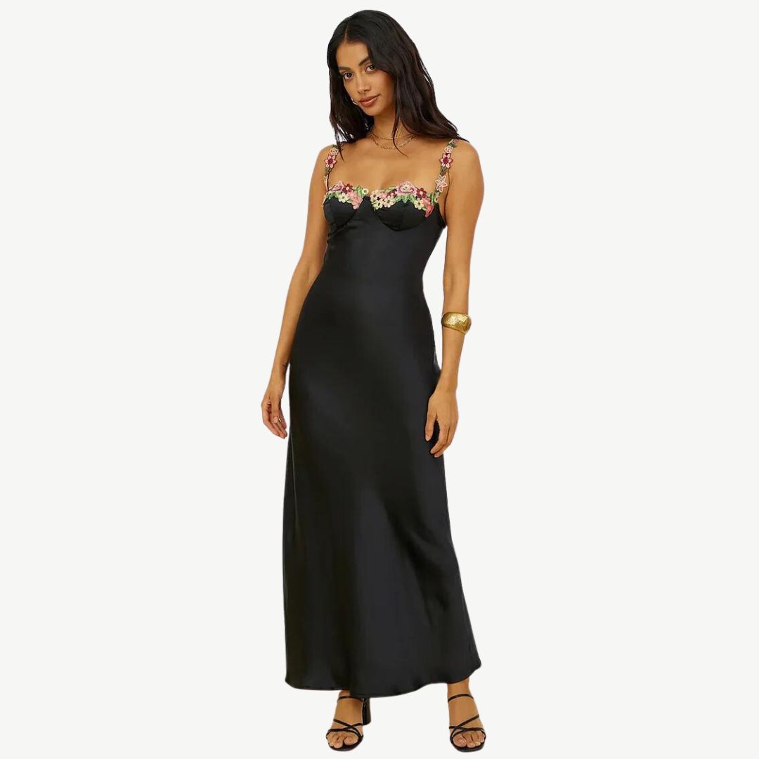 Model wearing the Maya Women's Embroidered Strap Dress, featuring intricate embroidery on the straps and a form-fitting, elegant silhouette, perfect for special occasions and sophisticated styling.