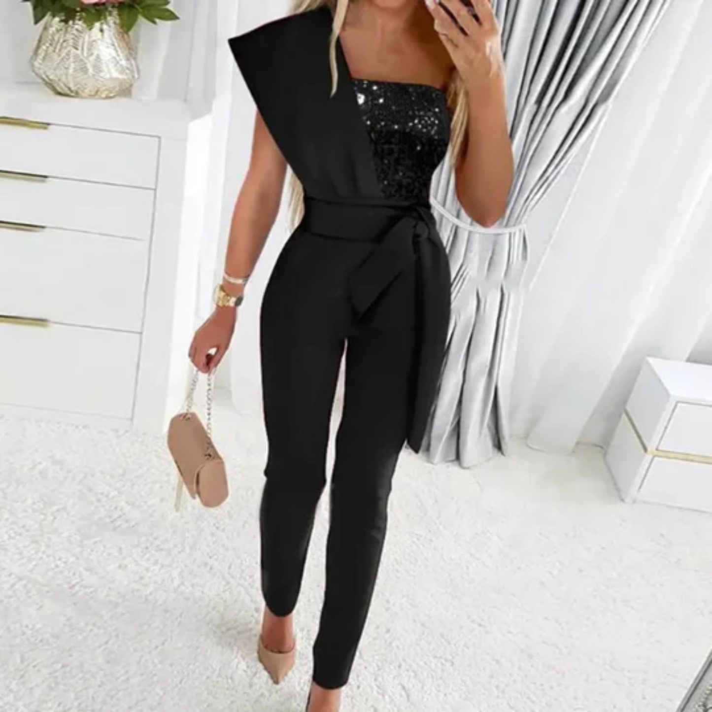 A Sophia's One-Shoulder Sequin Jumpsuit  Party wear with a fitted silhouette, featuring shimmering sequins throughout and a sleek, modern design perfect for evening events or special occasions.