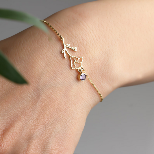 Close-up of the Lily Women's Floral Bracelet featuring a delicate floral pendant with a gemstone detail, showcasing its elegant and nature-inspired design.