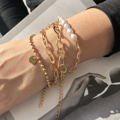 Close-up of a wrist adorned with the Ella Women's Layered Bracelet, showcasing its chic design with multiple layers and intricate details. A stylish accessory perfect for elevating any outfit.