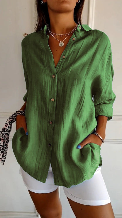 Stylish women's lightweight shirt with a relaxed fit, featuring button details and a casual, versatile design ideal for everyday wear.