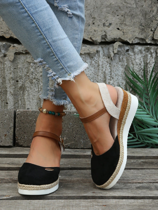 An image showcasing stylish women's wedge sandals with a comfortable design, featuring adjustable ankle straps and a supportive sole, perfect for casual or semi-formal outings.